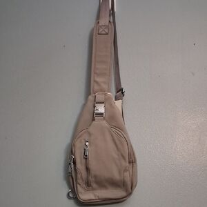 Madison West Los Angeles unisex gray/grey sling bag with multi compartment.